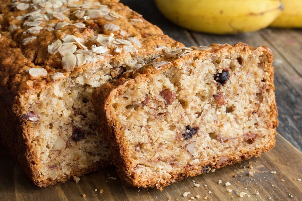 Sliced banana bread loaf with walnuts and oats | Aux Fourneaux