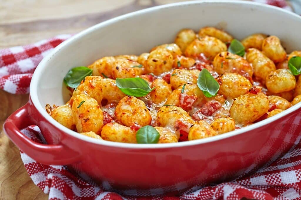gnocchi with tomato sauce and parmesan cheese | Aux Fourneaux Gnocchi alla sorrentina la vraie recette​ traditionnelle