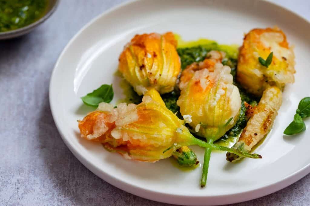 Fried courgette flowers stuffed with ricotta cheese in light tempura batter | Aux Fourneaux Fleurs de courgette farcies avec de la ricotta